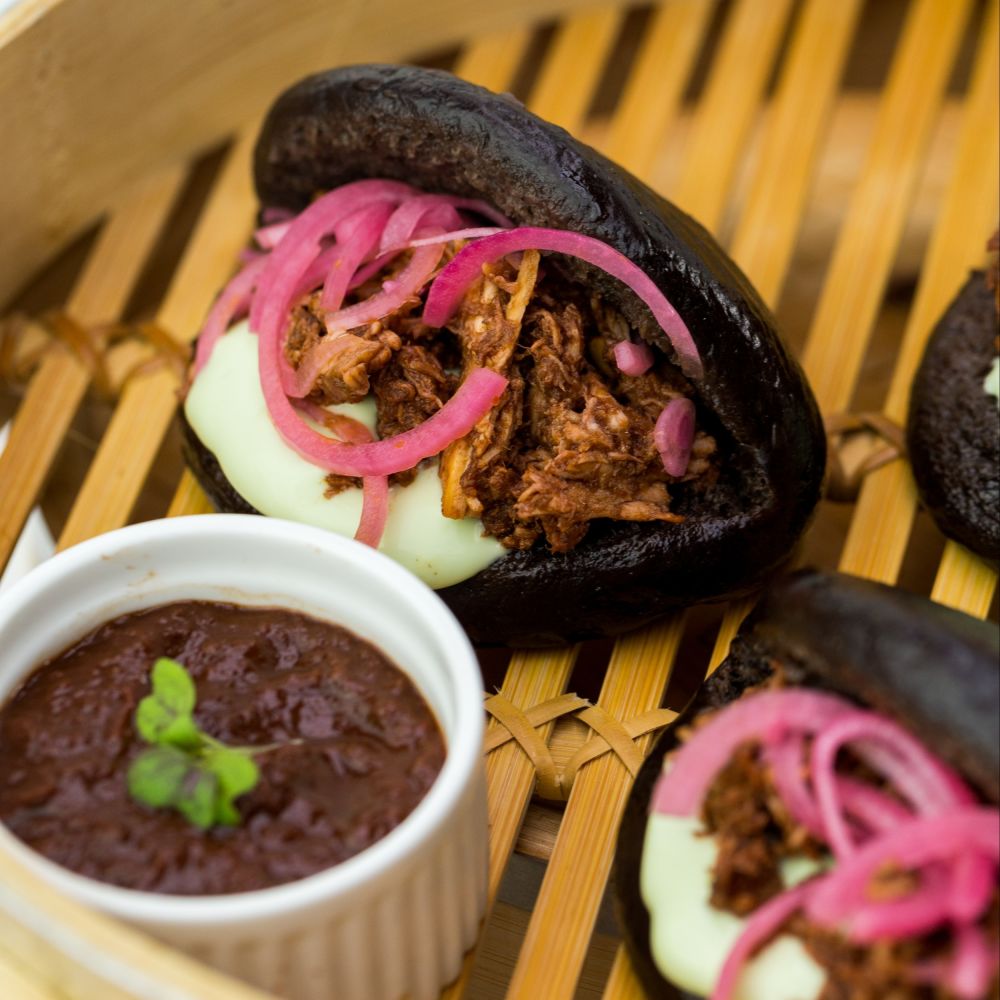 deZaan Steamed Buns filled with Crimson Red BBQ Pulled Pork