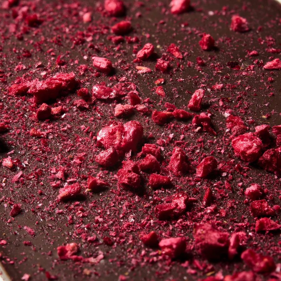 Ritual Chocolate The Après Chocolate 70% Dark Chocolate Bar with Sparkling White Wine & Dried Raspberries Lifestyle-min