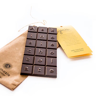 Askinosie Tanzania 60% Dark Chocolate Bar with Jeni's Malted Milk Open Lifestyle